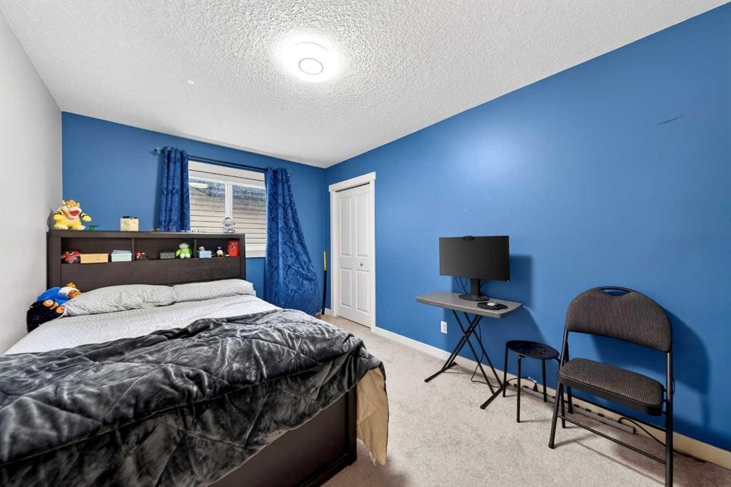148 Walden Square Se, Calgary, AB - Indoor Photo Showing Bedroom
