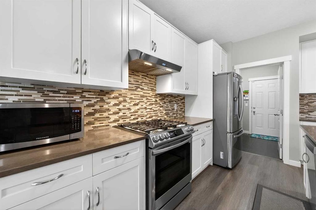 148 Walden Square Se, Calgary, AB - Indoor Photo Showing Kitchen With Stainless Steel Kitchen With Upgraded Kitchen