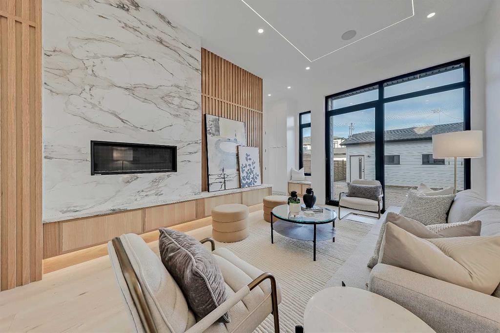 2008 8 Avenue Se, Calgary, AB - Indoor Photo Showing Living Room With Fireplace