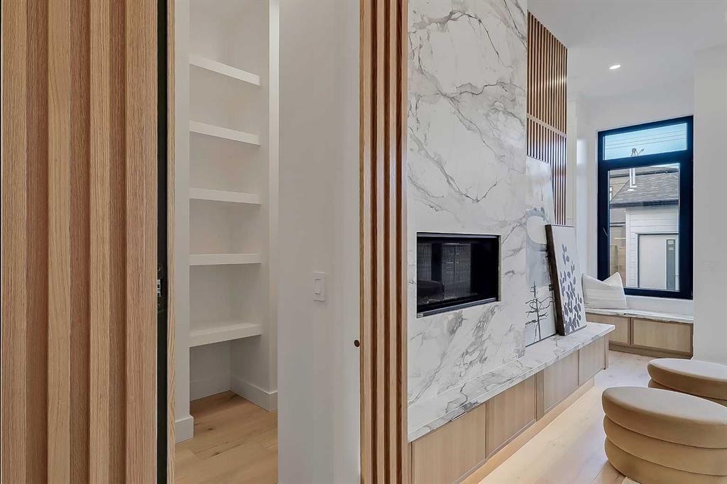 2008 8 Avenue Se, Calgary, AB - Indoor Photo Showing Other Room With Fireplace