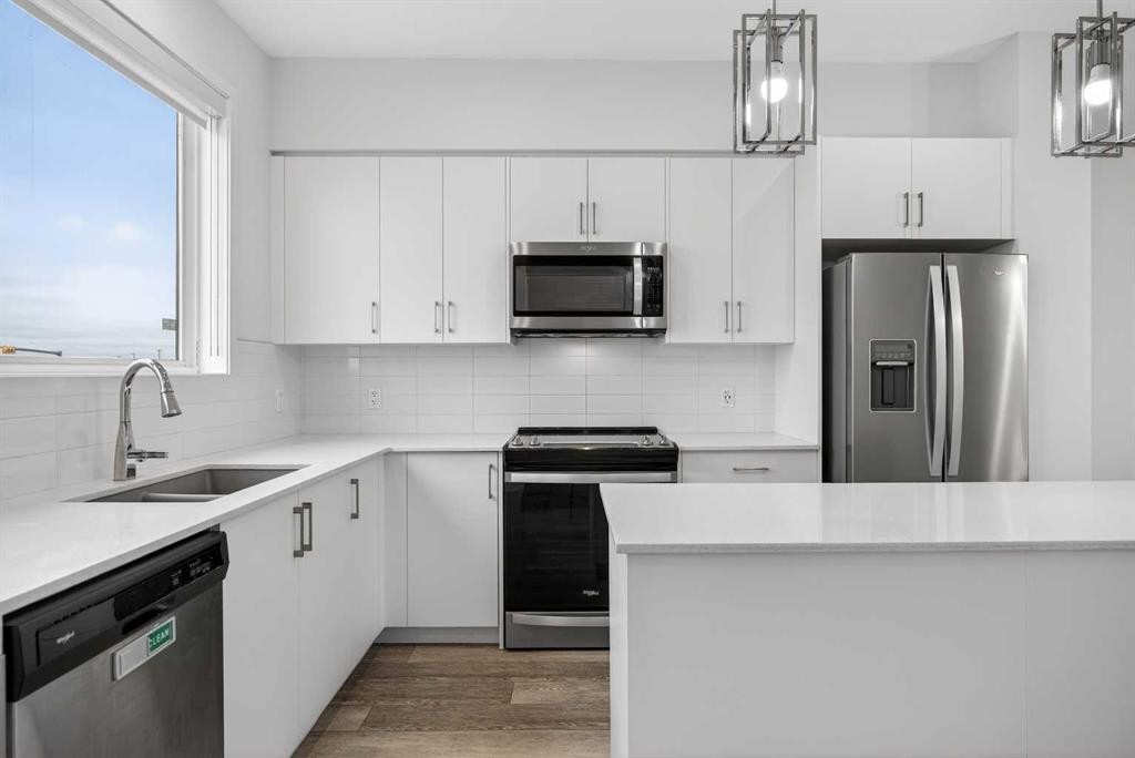 882 Cornerstone Boulevard Ne, Calgary, AB - Indoor Photo Showing Kitchen With Stainless Steel Kitchen With Double Sink With Upgraded Kitchen
