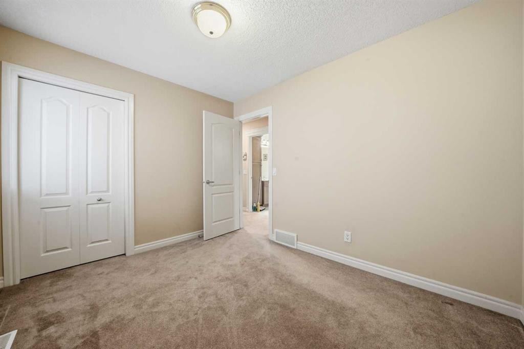 27 Saddleland Way Ne, Calgary, AB - Indoor Photo Showing Other Room