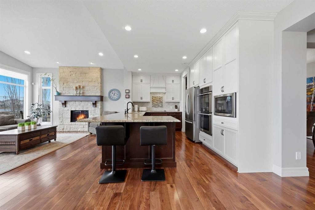 113 Cranarch Common Se, Calgary, AB - Indoor With Fireplace
