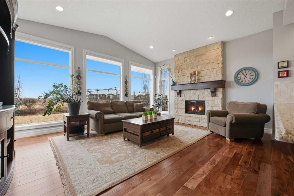 113 Cranarch Common Se, Calgary, AB - Indoor Photo Showing Living Room With Fireplace