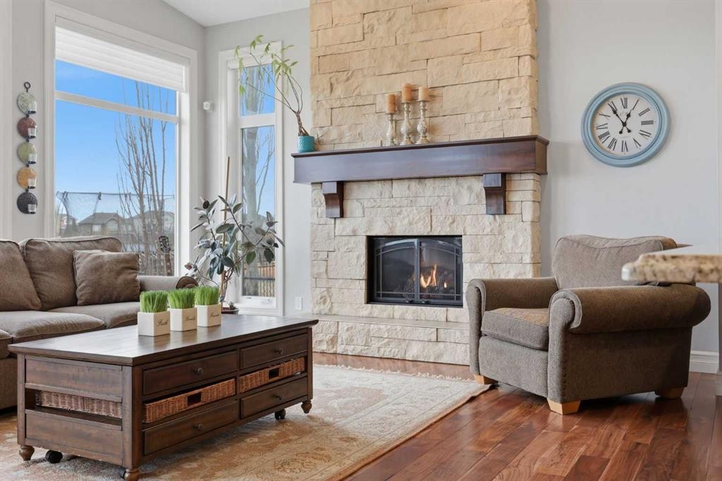 113 Cranarch Common Se, Calgary, AB - Indoor Photo Showing Living Room With Fireplace