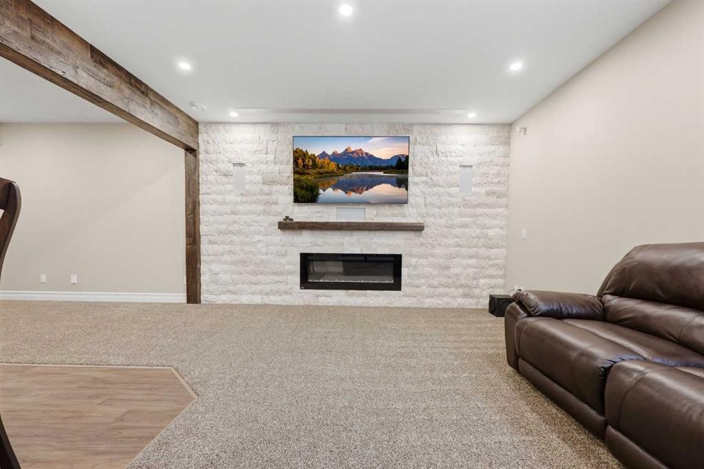 113 Cranarch Common Se, Calgary, AB - Indoor With Fireplace