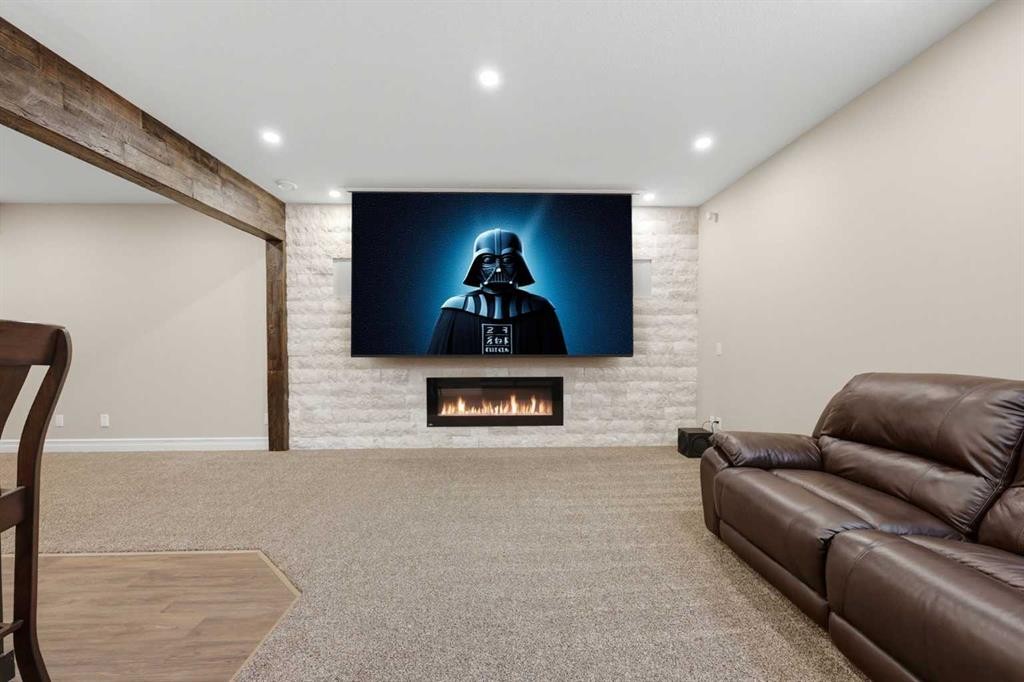 113 Cranarch Common Se, Calgary, AB - Indoor With Fireplace