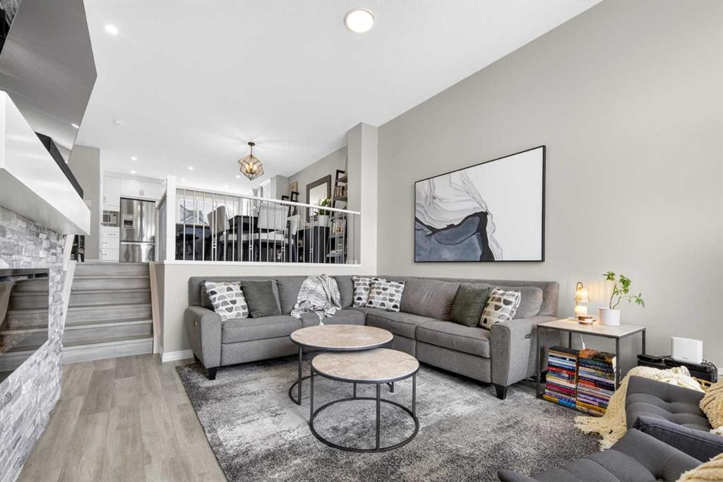 261 Masters Road Se, Calgary, AB - Indoor Photo Showing Living Room With Fireplace