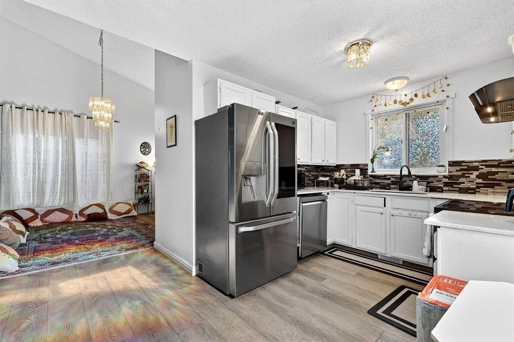 236 Mckerrell Way Se, Calgary, AB - Indoor Photo Showing Kitchen With Stainless Steel Kitchen
