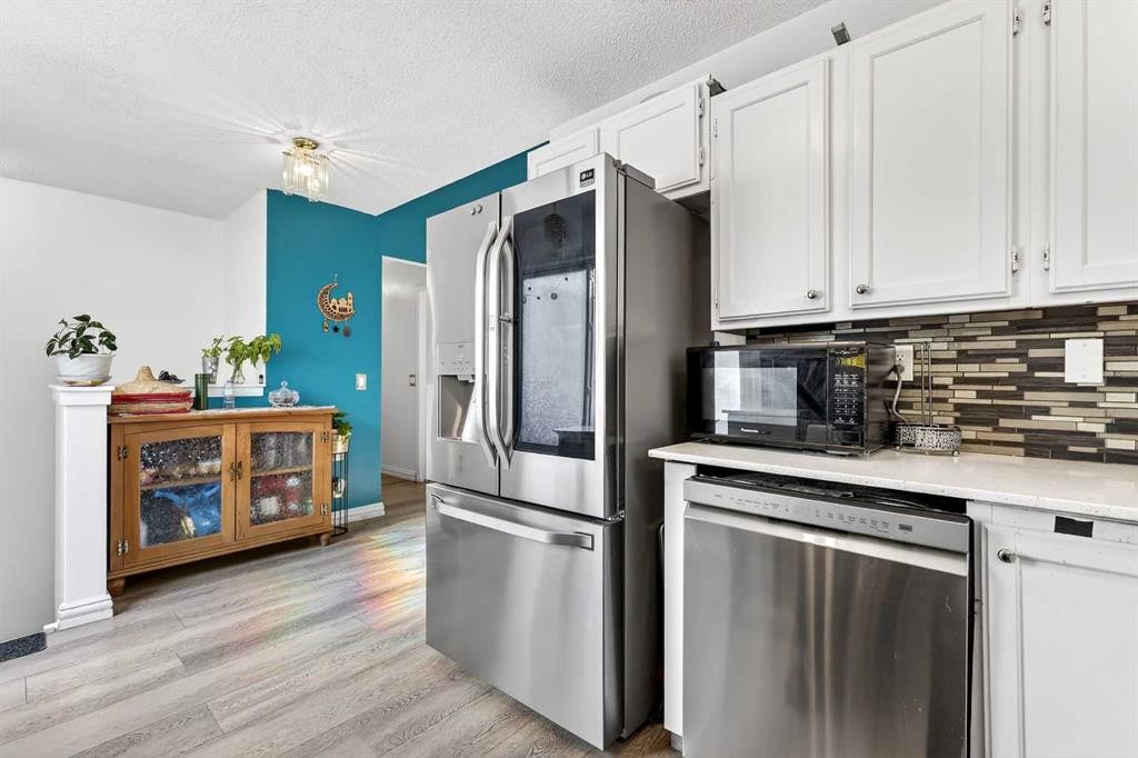 236 Mckerrell Way Se, Calgary, AB - Indoor Photo Showing Kitchen With Stainless Steel Kitchen