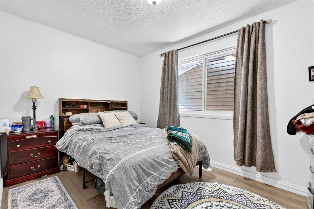236 Mckerrell Way Se, Calgary, AB - Indoor Photo Showing Bedroom