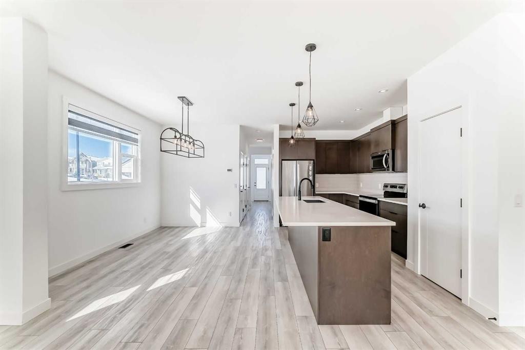 357 Calhoun Common Ne, Calgary, AB - Indoor Photo Showing Kitchen With Upgraded Kitchen