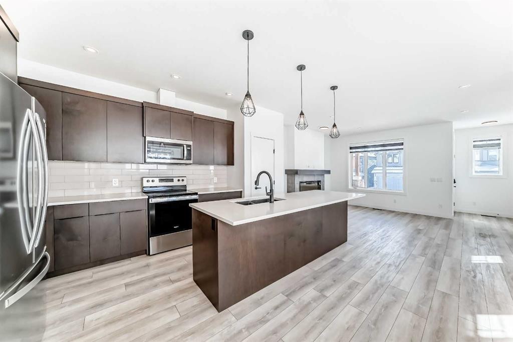 357 Calhoun Common Ne, Calgary, AB - Indoor Photo Showing Kitchen With Upgraded Kitchen