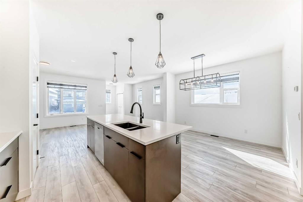 357 Calhoun Common Ne, Calgary, AB - Indoor Photo Showing Kitchen With Double Sink