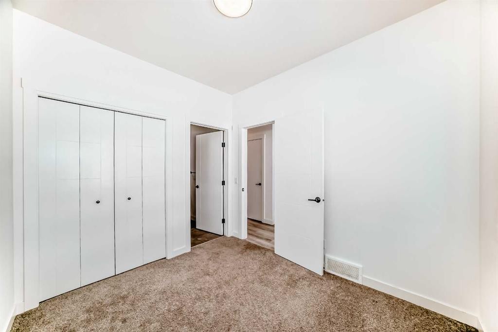 357 Calhoun Common Ne, Calgary, AB - Indoor Photo Showing Other Room
