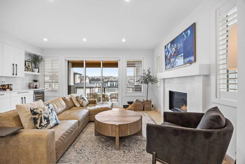 80 Timberline Way Sw, Calgary, AB - Indoor Photo Showing Living Room With Fireplace