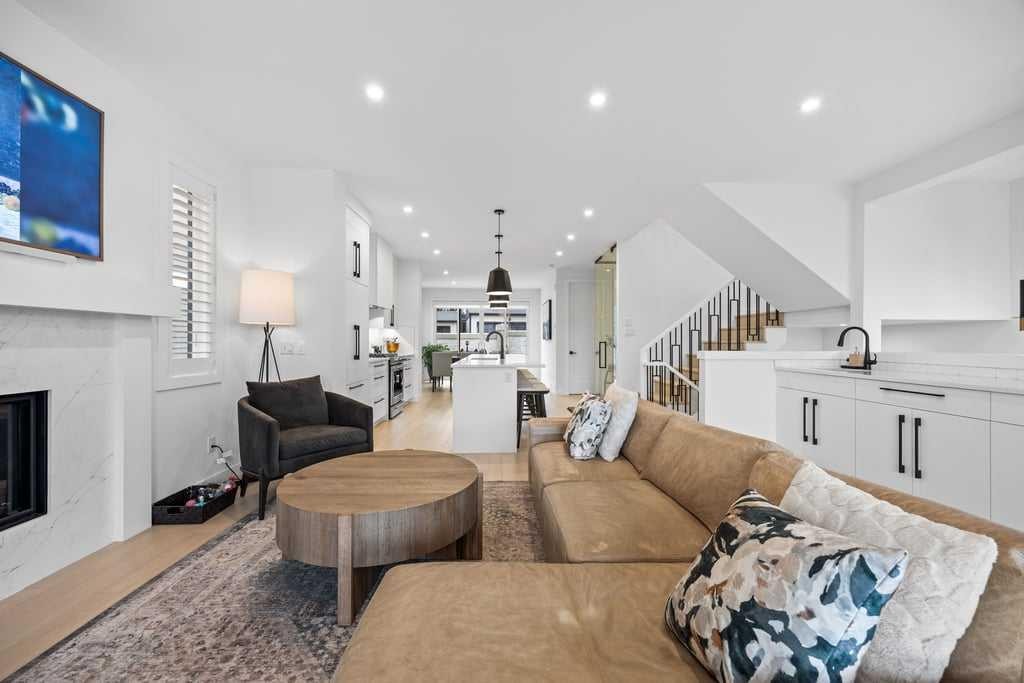 80 Timberline Way Sw, Calgary, AB - Indoor Photo Showing Living Room With Fireplace