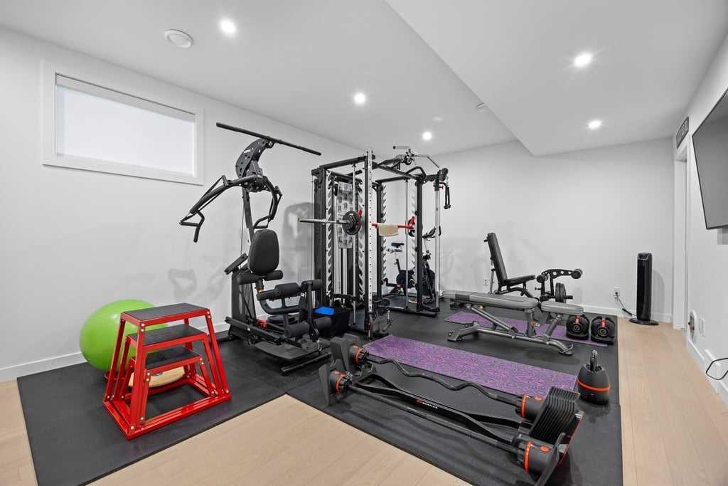 80 Timberline Way Sw, Calgary, AB - Indoor Photo Showing Gym Room