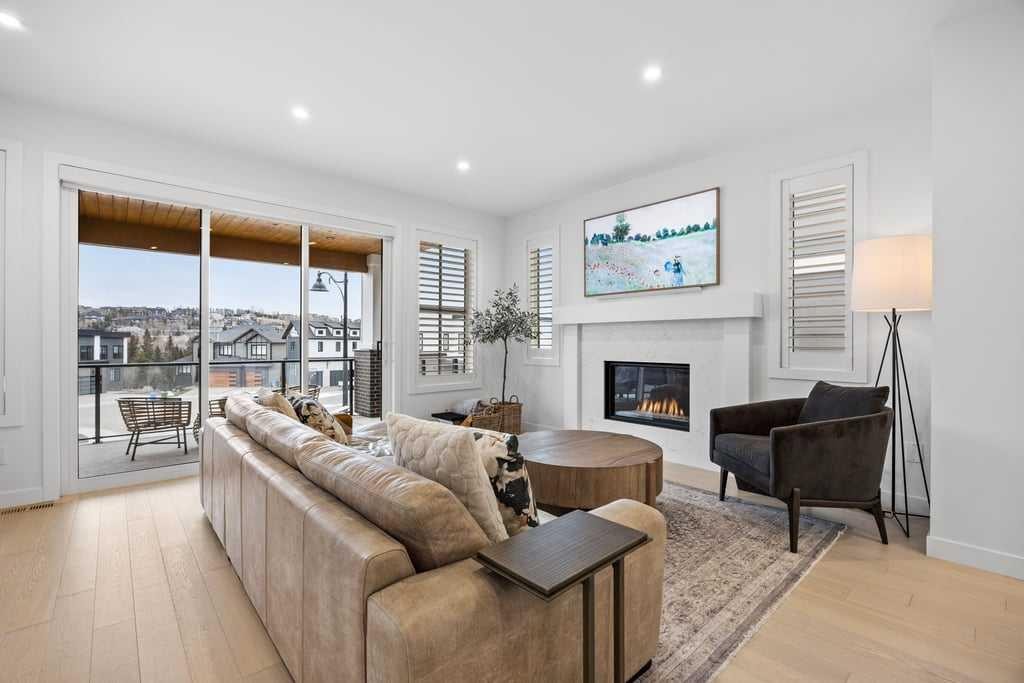 80 Timberline Way Sw, Calgary, AB - Indoor Photo Showing Living Room With Fireplace