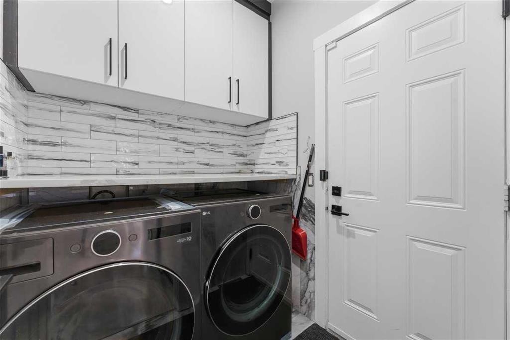 73 Saddleland Close Ne, Calgary, AB - Indoor Photo Showing Laundry Room