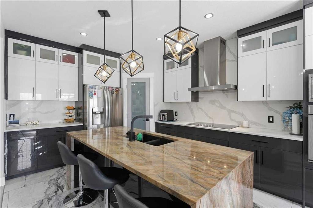 73 Saddleland Close Ne, Calgary, AB - Indoor Photo Showing Kitchen With Double Sink With Upgraded Kitchen