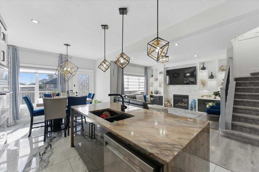 73 Saddleland Close Ne, Calgary, AB - Indoor Photo Showing Other Room With Fireplace