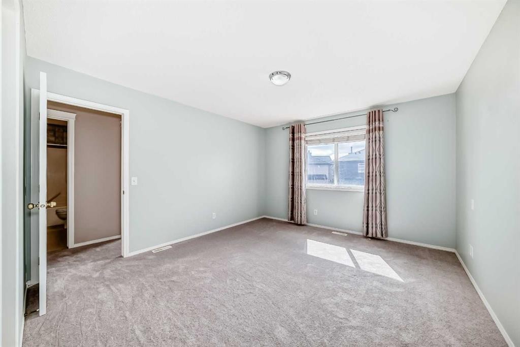 9 Somerside Crescent Sw, Calgary, AB - Indoor Photo Showing Other Room