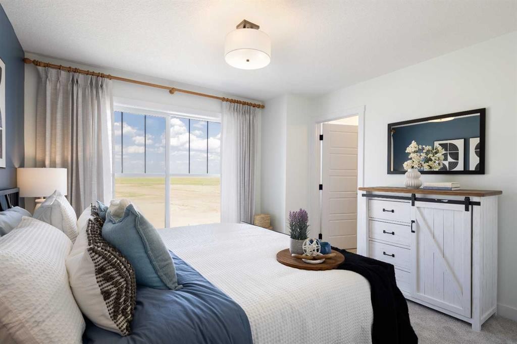 13 Wild Rose Way Se, Calgary, AB - Indoor Photo Showing Bedroom