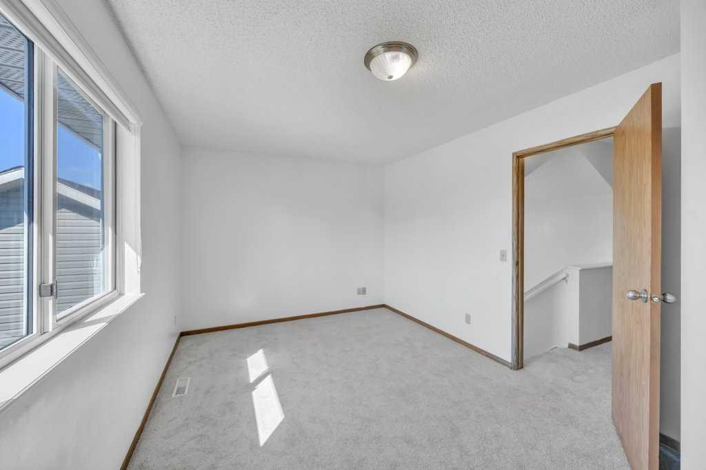 67 Martinwood Road Ne, Calgary, AB - Indoor Photo Showing Other Room