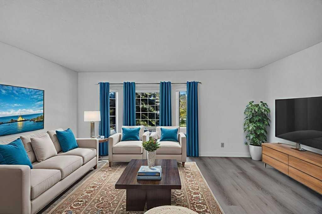 67 Martinwood Road Ne, Calgary, AB - Indoor Photo Showing Living Room