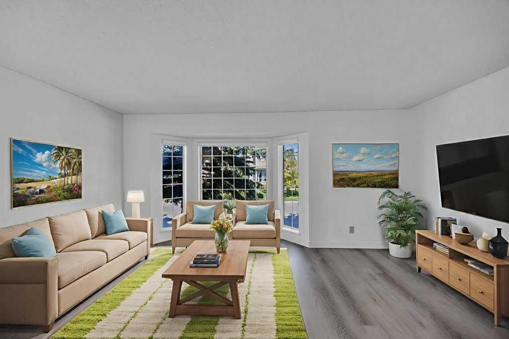 67 Martinwood Road Ne, Calgary, AB - Indoor Photo Showing Living Room