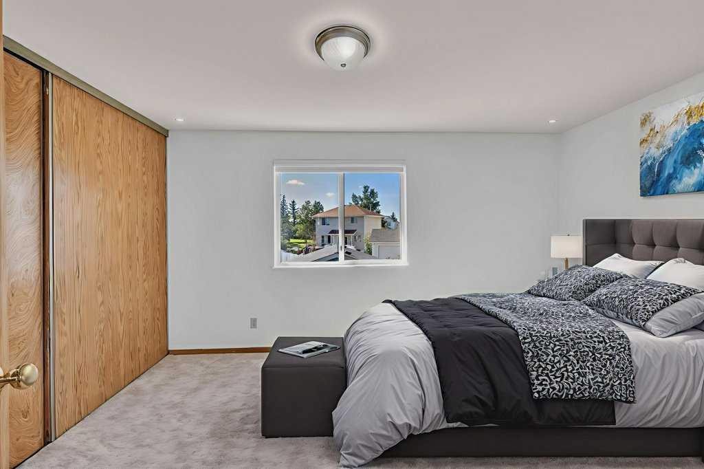 67 Martinwood Road Ne, Calgary, AB - Indoor Photo Showing Bedroom