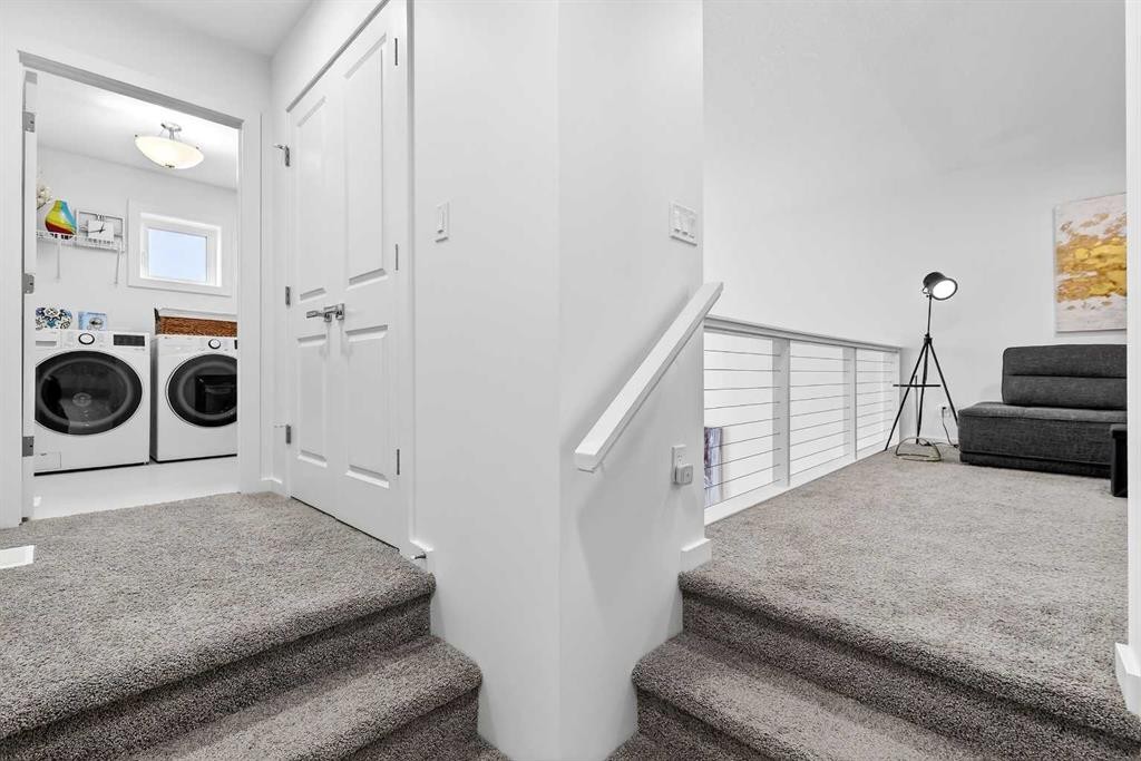42 Heirloom Manor Se, Calgary, AB - Indoor Photo Showing Laundry Room
