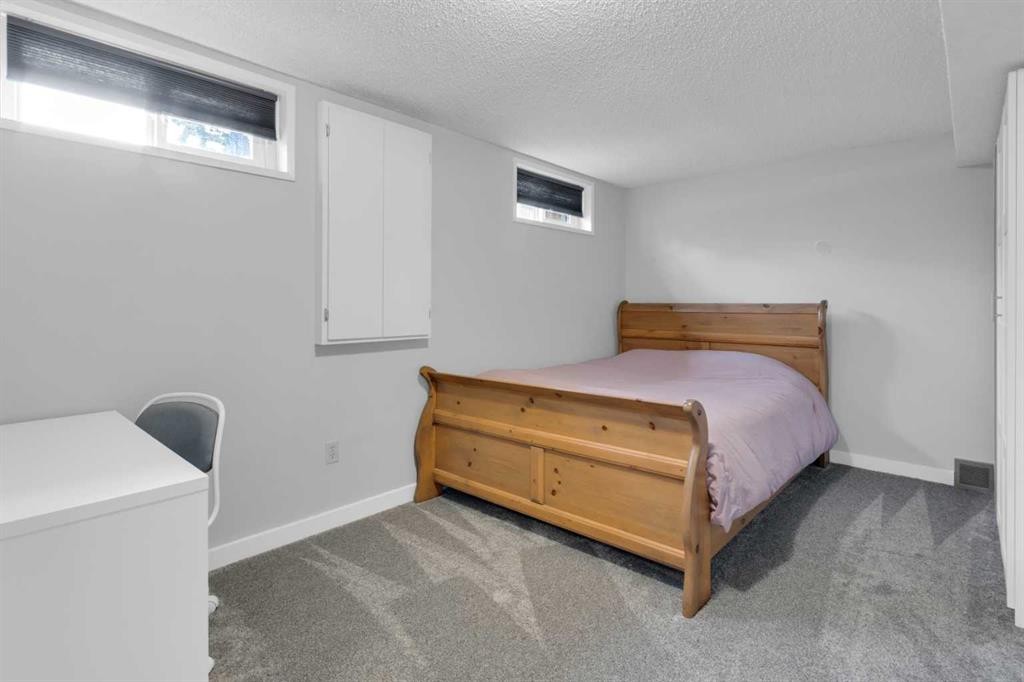 356 Cannington Place Sw, Calgary, AB - Indoor Photo Showing Bedroom