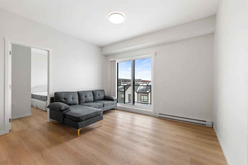 6403-20295 Seton Way Se, Calgary, AB - Indoor Photo Showing Living Room