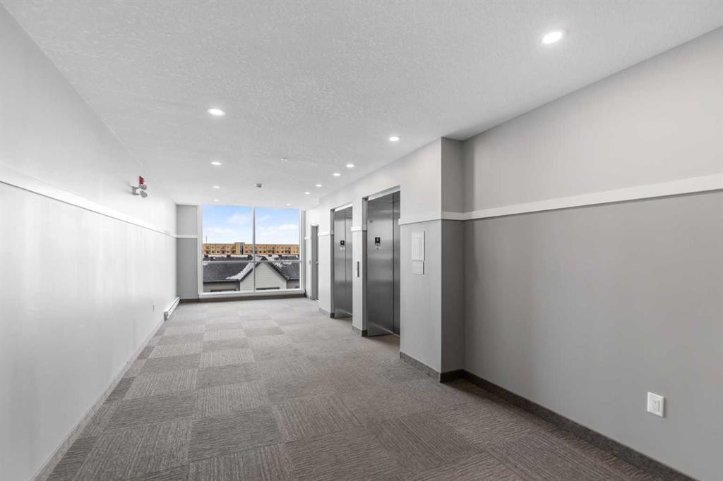6403-20295 Seton Way Se, Calgary, AB - Indoor Photo Showing Other Room