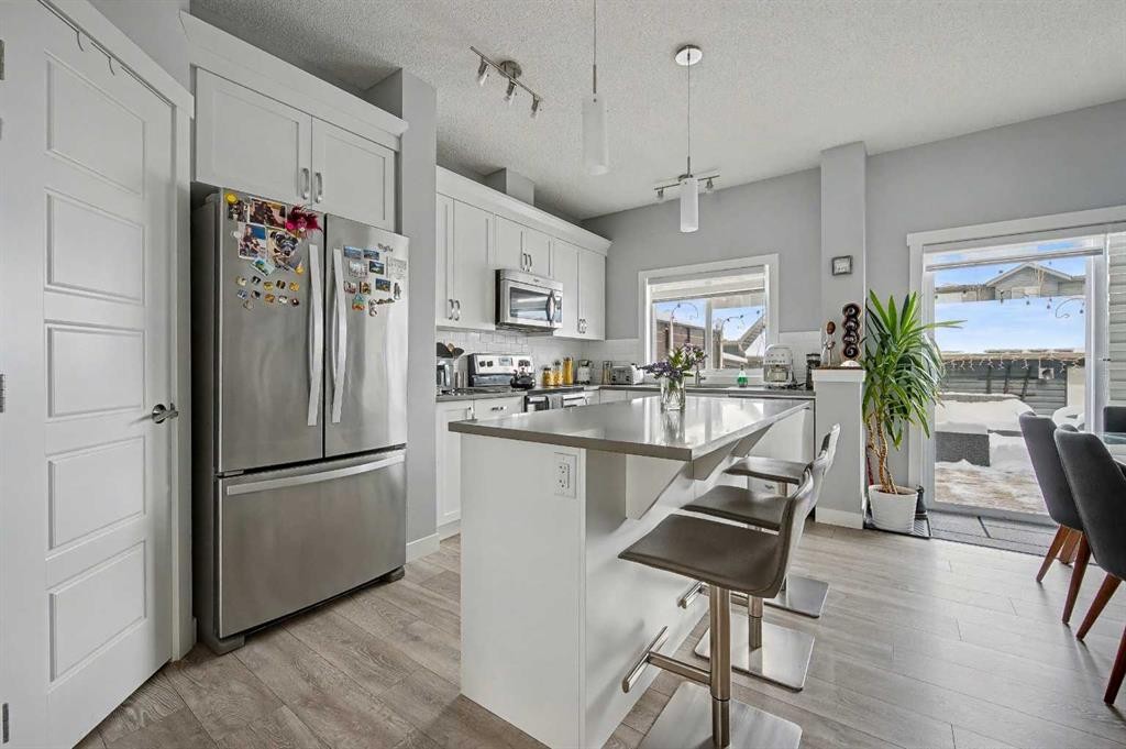 38 Sage Bluff Gate Nw, Calgary, AB - Indoor Photo Showing Kitchen With Upgraded Kitchen
