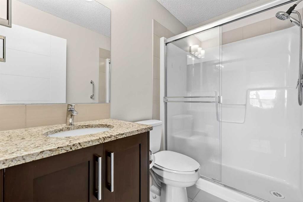 308-402 Marquis Lane Se, Calgary, AB - Indoor Photo Showing Bathroom