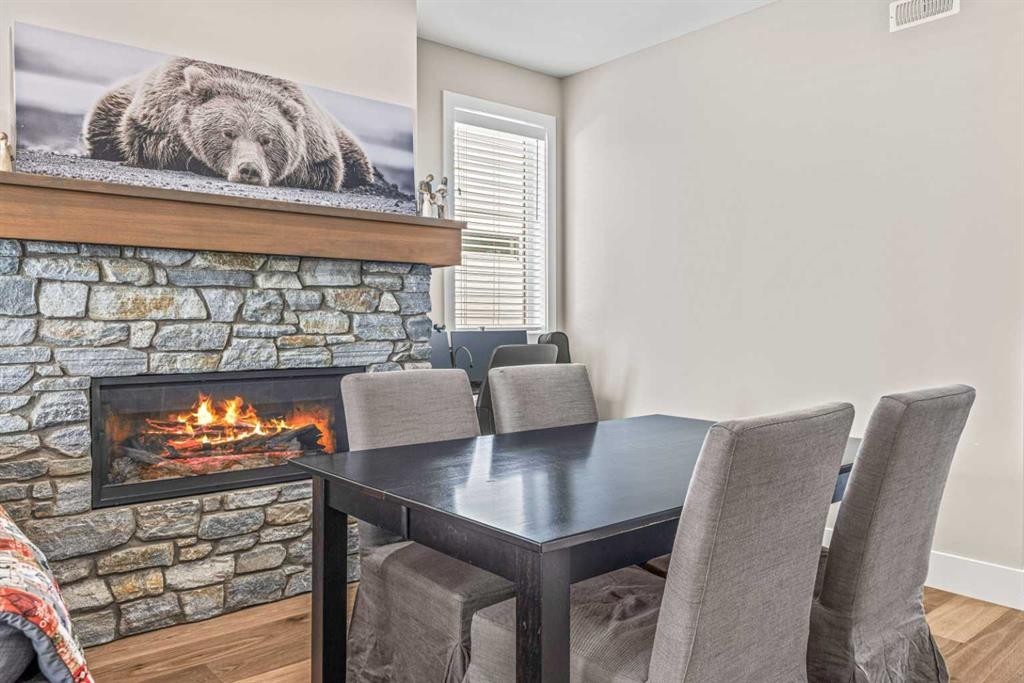 201G-1101 Three Sisters Parkway, Canmore, AB - Indoor With Fireplace