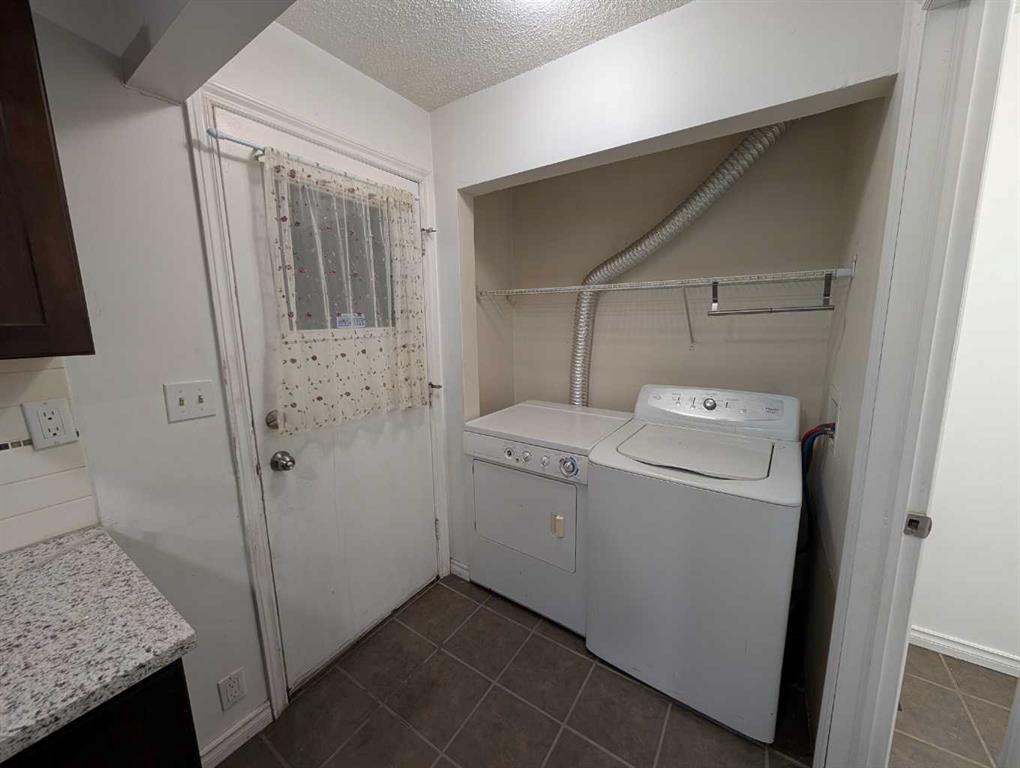114 Castledale Way Ne, Calgary, AB - Indoor Photo Showing Laundry Room