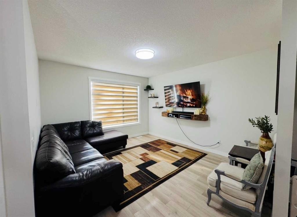 628 Cornerstone Boulevard Ne, Calgary, AB - Indoor Photo Showing Living Room