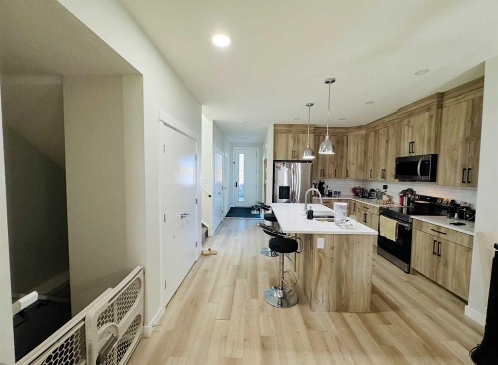 628 Cornerstone Boulevard Ne, Calgary, AB - Indoor Photo Showing Kitchen With Double Sink With Upgraded Kitchen