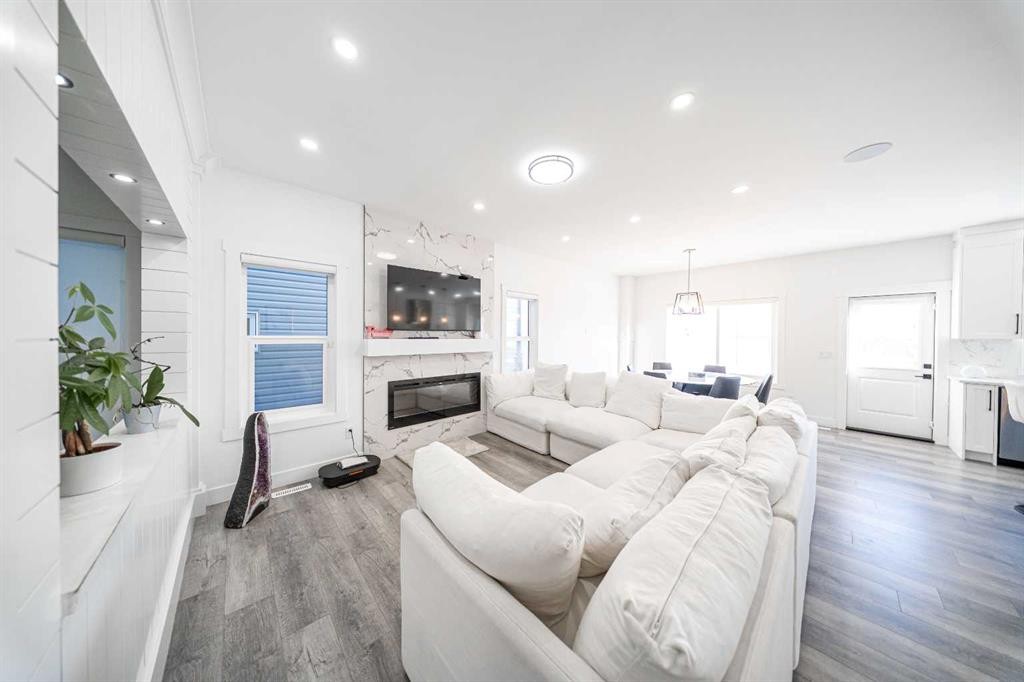 123 Saddlecrest Grove Ne, Calgary, AB - Indoor Photo Showing Living Room With Fireplace
