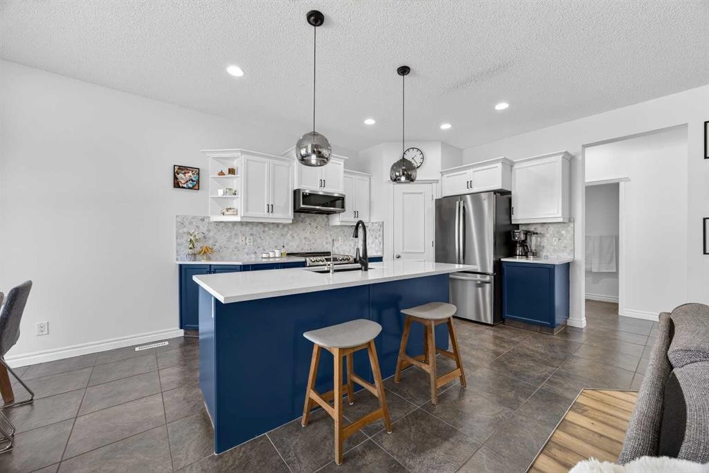 340 Prestwick Terrace Se, Calgary, AB - Indoor Photo Showing Kitchen With Upgraded Kitchen