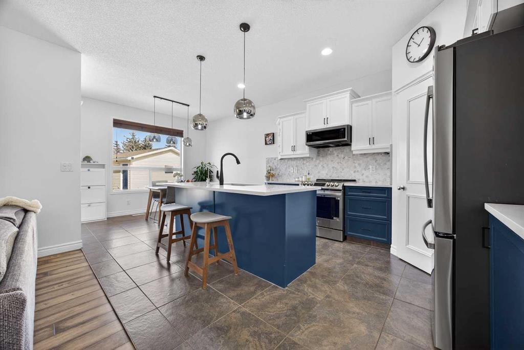 340 Prestwick Terrace Se, Calgary, AB - Indoor Photo Showing Kitchen With Upgraded Kitchen