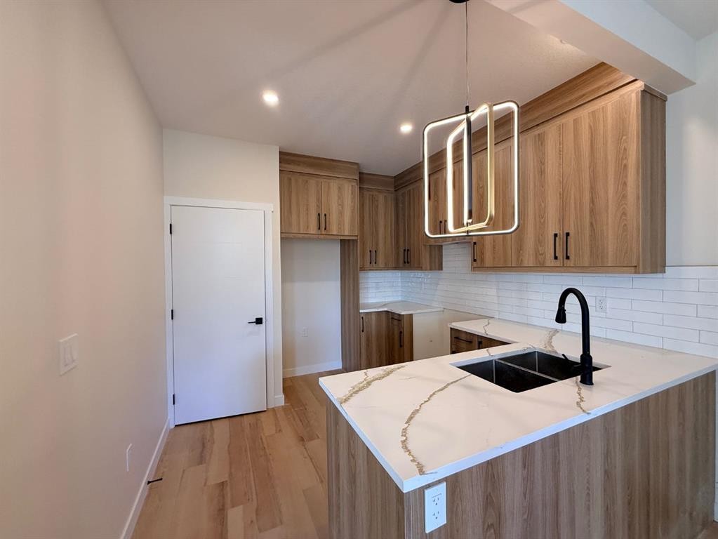 1997 Mccaskill Drive, Crossfield, AB - Indoor Photo Showing Kitchen With Double Sink