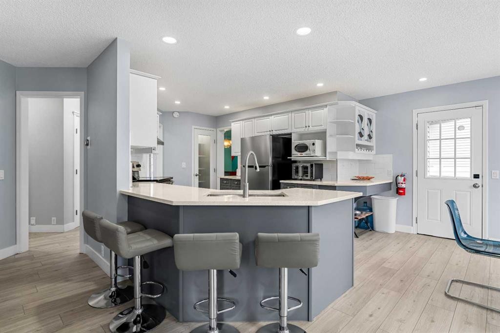 48 Douglas Park Boulevard Se, Calgary, AB - Indoor Photo Showing Kitchen With Upgraded Kitchen