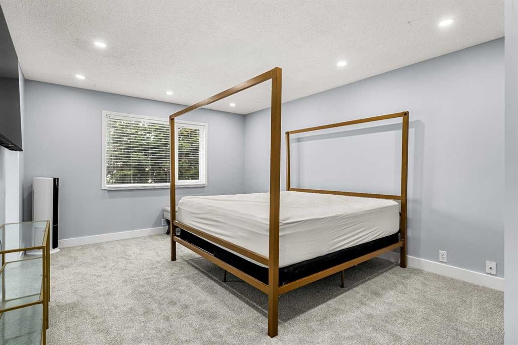 48 Douglas Park Boulevard Se, Calgary, AB - Indoor Photo Showing Bedroom