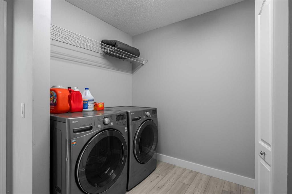 48 Douglas Park Boulevard Se, Calgary, AB - Indoor Photo Showing Laundry Room
