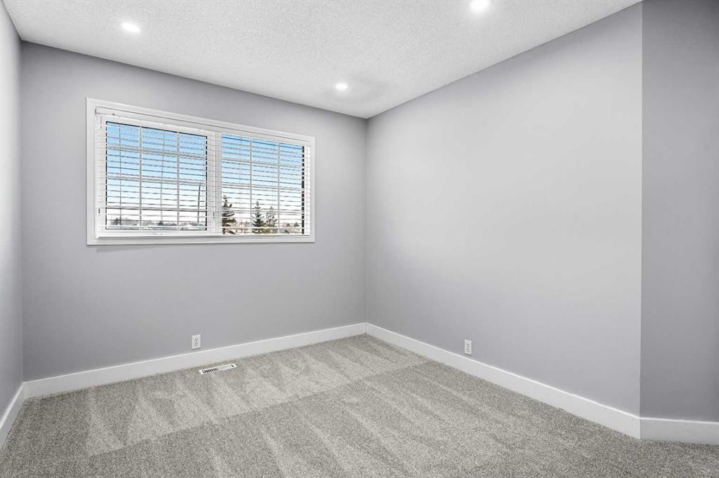 48 Douglas Park Boulevard Se, Calgary, AB - Indoor Photo Showing Other Room